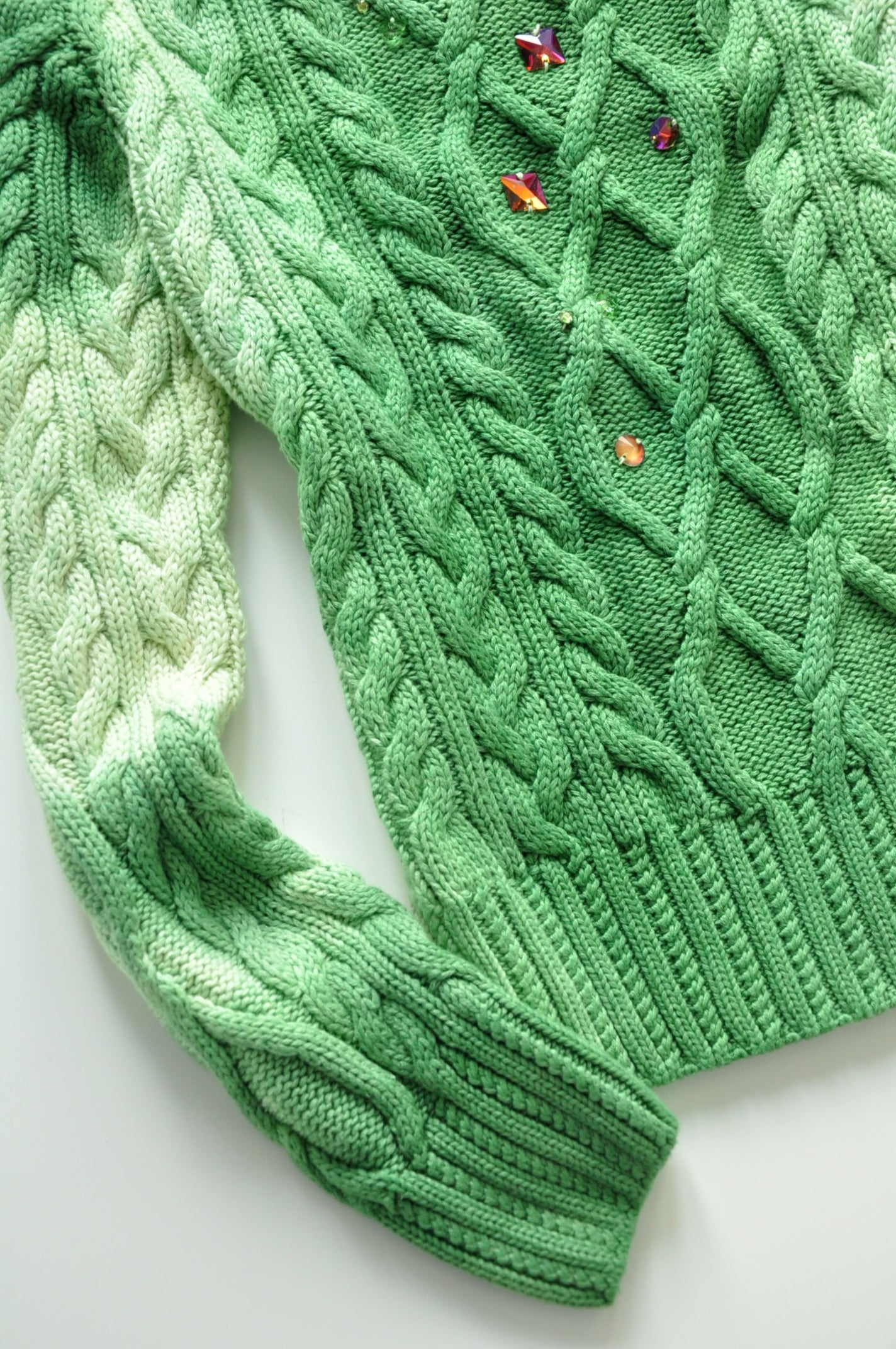 Green cable knit jumper