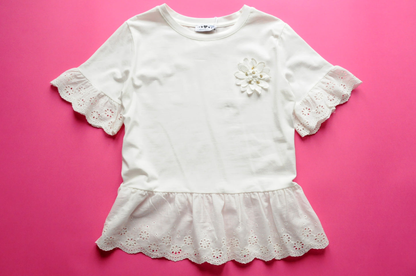 Off white broderie anglaise frilled peplum tee with 3D gem flower detail