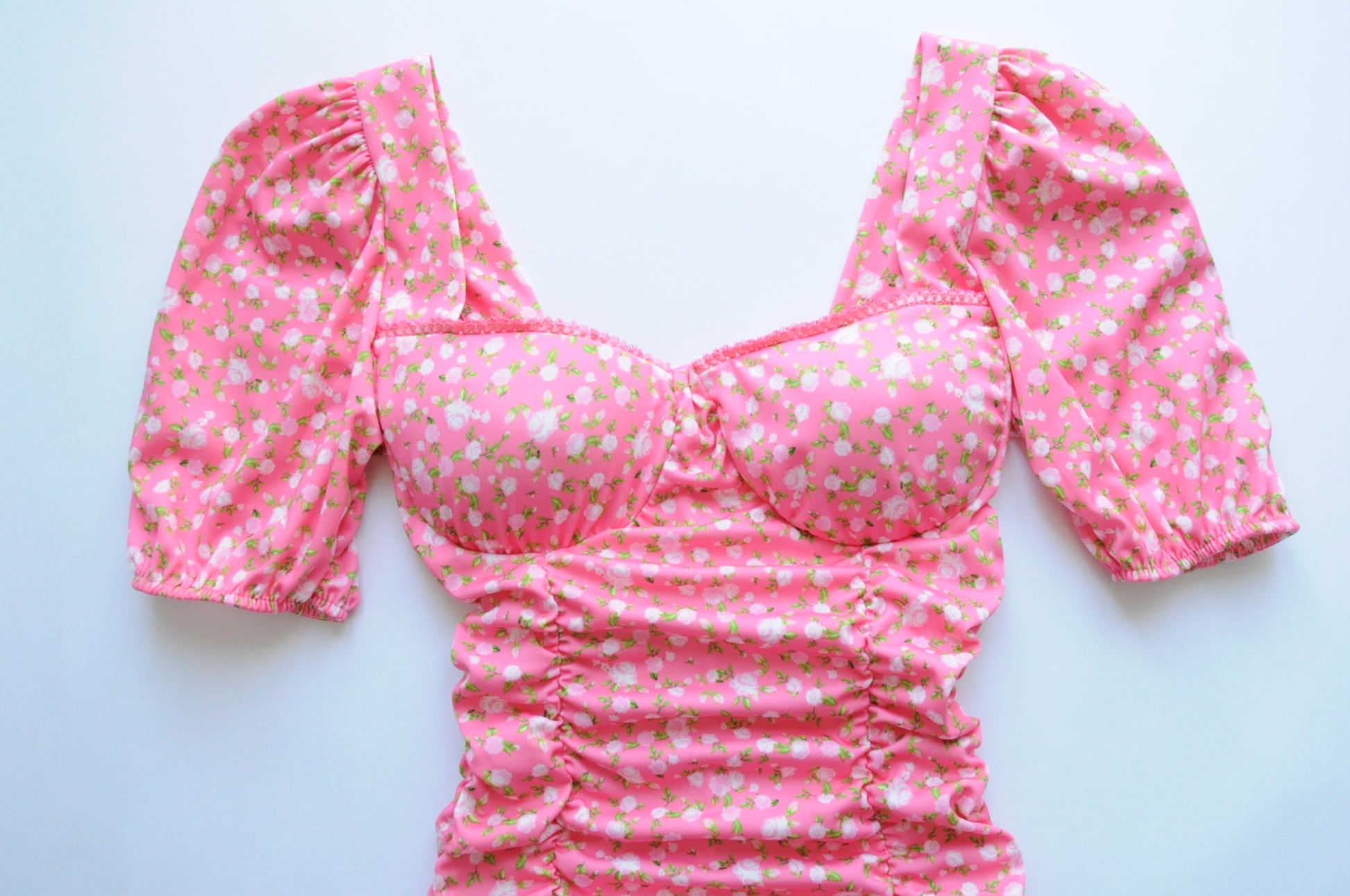 Floral drapped mini dress in pink