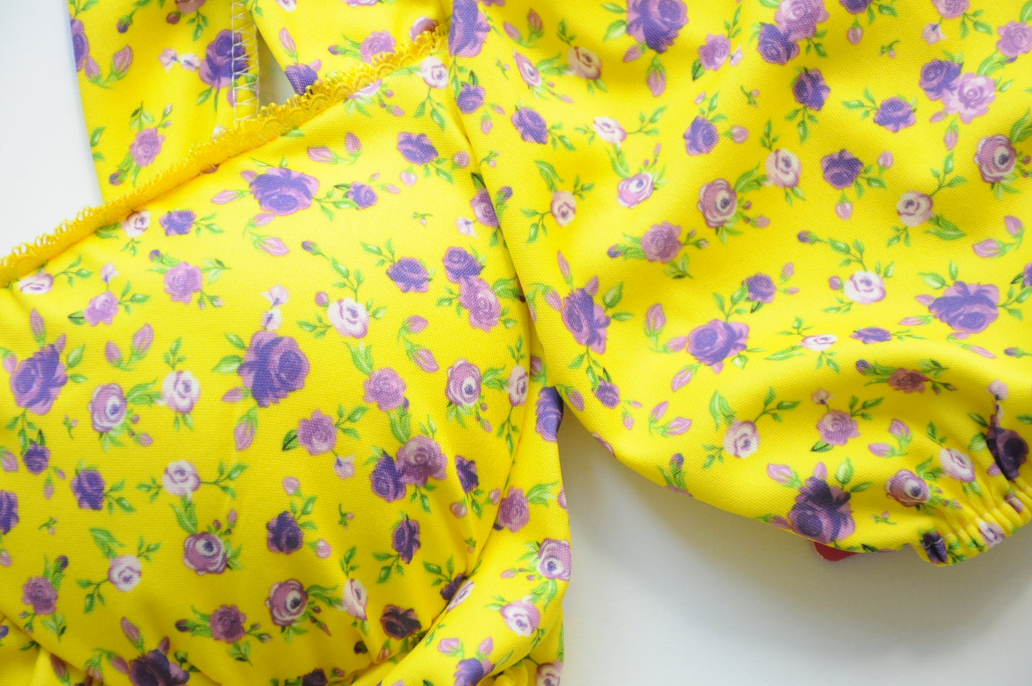 Floral drapped mini dress in yellow