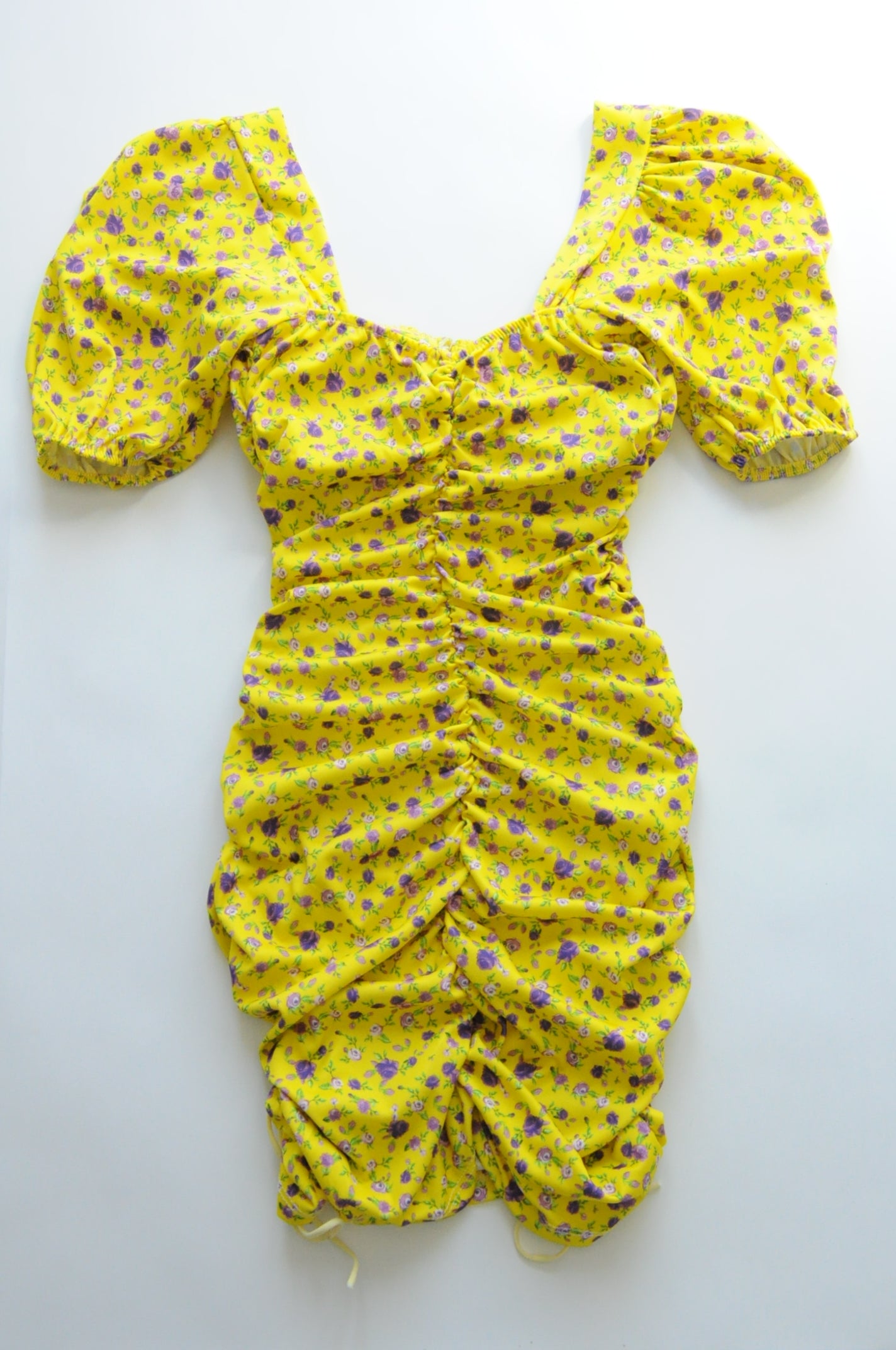 Floral drapped mini dress in yellow